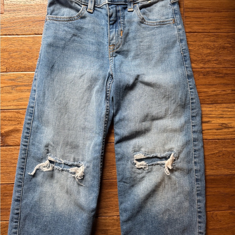 Distressed Blue Denim Jeans